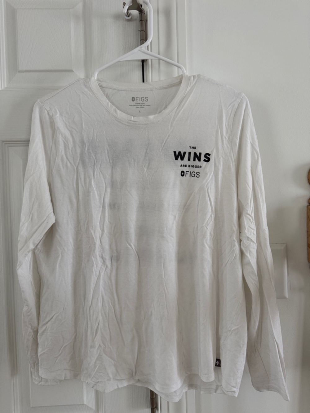 FIGS Men’s White Long-Sleeve Tee with Black Chest Graphic